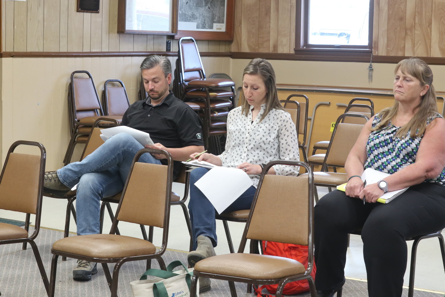 Rocco Baldassari, left, general manager of Kittatinny-Northgate Resorts, Mary Campbell, project manager for Northgate Resorts and Jody Allen of LaBella Associates listen to the proposed expansion and rebranding project of Kittatinny Campgrounds as Camp Fimfo-Catskills.
